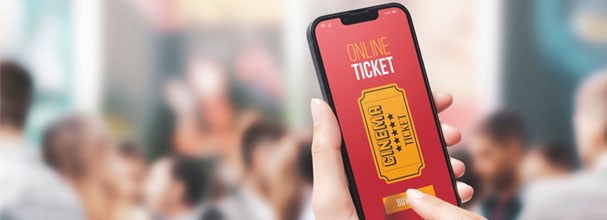 Picture of a customer buying a concert ticket on mobile phone